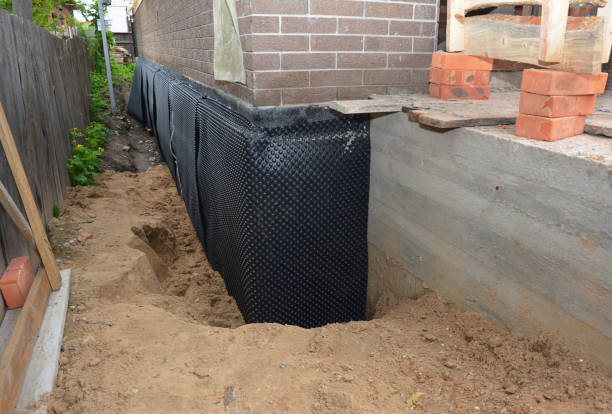 SJ Waterproofing Pros technician performing targeted Exterior Waterproofing assessment in Rapidan, VA